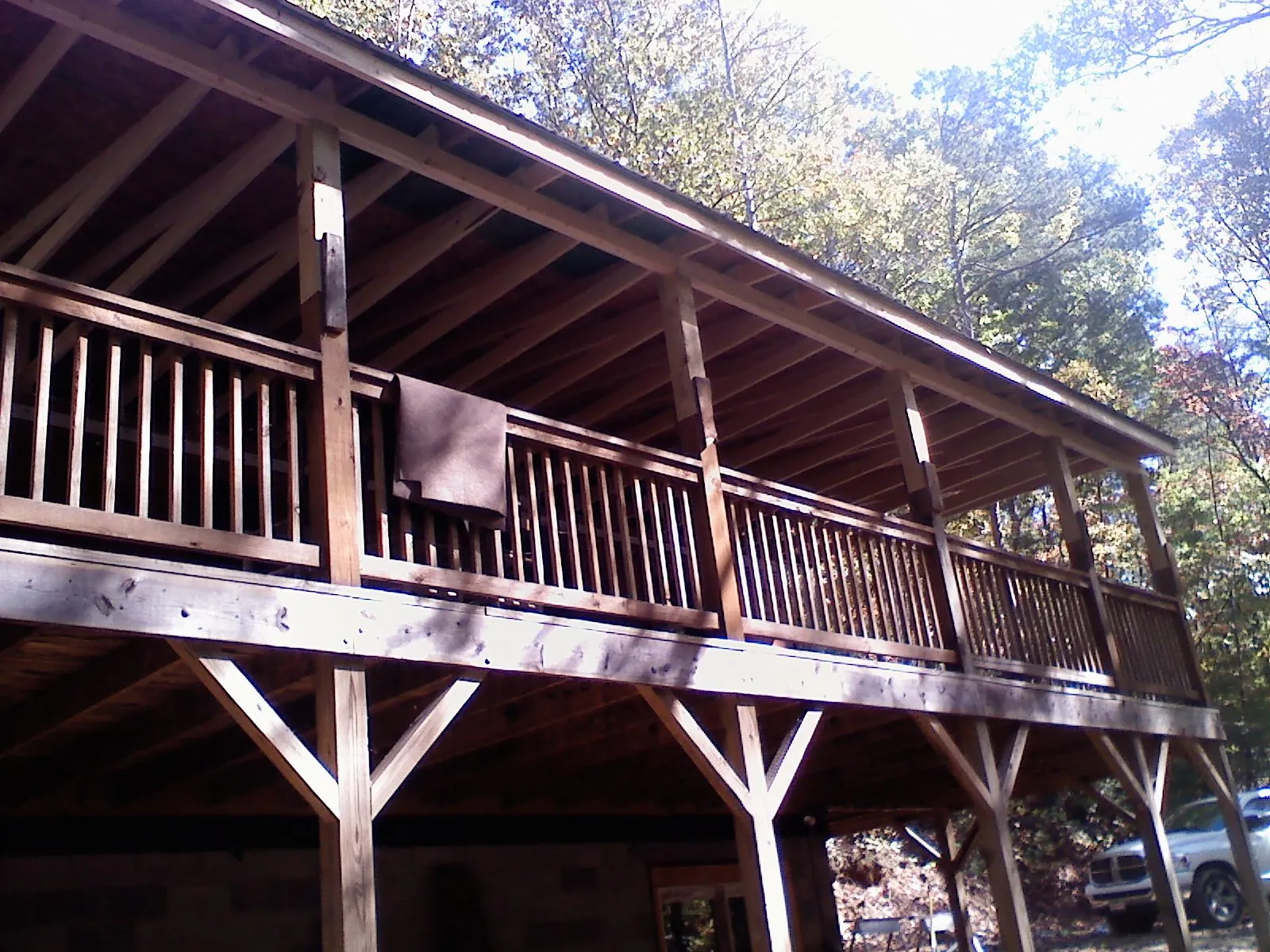 Timber framing under a new elevated porch and deck — Roof Leak Repair in Hiawassee by Roofing Brothers